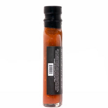 Load image into Gallery viewer, Bottle of hot sauce with a black cap on a white background
