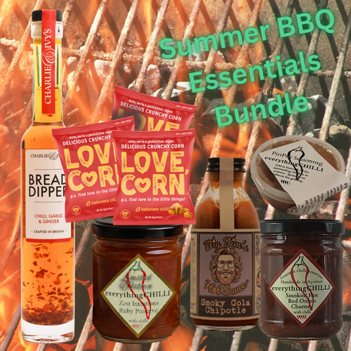 Summer BBQ Essentials Bundle with various condiments, sauces and corn snacks on a grill background
