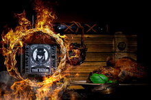 Load image into Gallery viewer, Flaming bottle of Elixir hot sauce with food in the background
