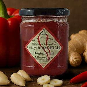 Gourmet chilli jam beside its fresh natural ingredients